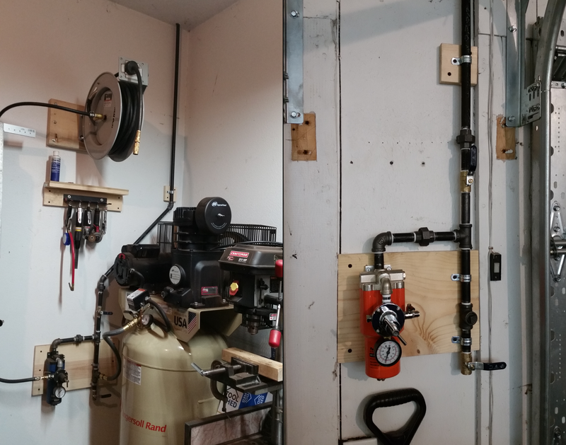 Not pictured: a bunch of pipe running through the attic, angled towards the drop for condensation drainage purposes
